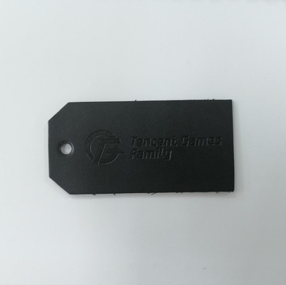 Αποτυπωμένο σε ανάγλυφο λογότυπων σουέτ Microfiber PU δέρματος χρώμα συνήθειας ετικετών Washable