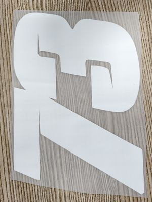 Προσαρμοσμένη ετικέτα μόδας DTF ταινία αυτοκόλλησης σε μεταφορά σιδέρωσης PET για μπλουζάκια